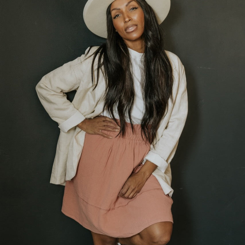 Forever romantic and forever going to be in your closet. This closet staple will pair with graphic tees, ruffled blouses, and all the jackets you can get your hands on. Perfectly draped for spring and summer events, family photos, and outdoor concerts. The dusty salmon hue is a timeless color that adds to every palette.