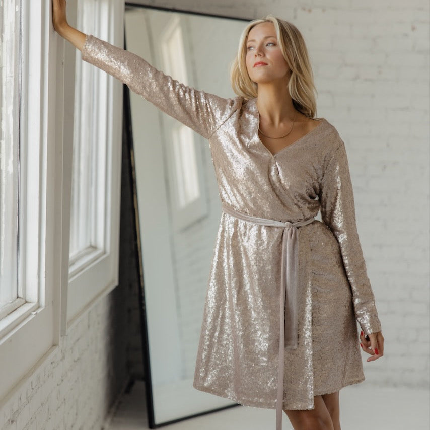 The holiday season is the perfect excuse to break out the sequins and the Eleanor is ready to rise to the occasion. This luxe faux wrap dress gets a high-shine makeover thanks to the paillette adornments in rich metallic hues. The Eleanor is an ideal party dress but we suggest wearing it any time you want a little glamour in your life. 
