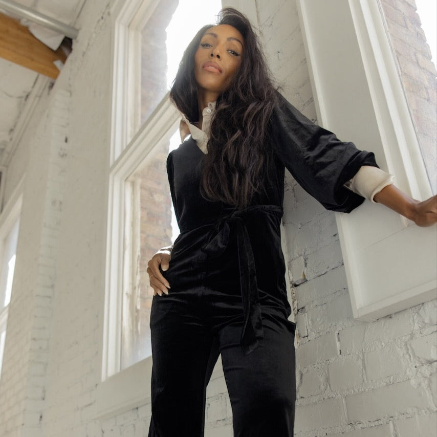 Look no further than the Beverley Woods for a style that goes the distance. Elevated in design, this jumpsuit is fabricated with a velvet material enhanced with a waist tie and v-neckline. The straight-leg silhouette trousers lend a sophisticated touch to such a modern piece. Pair with your favorite heels to cut a striking figure during your next event or date night