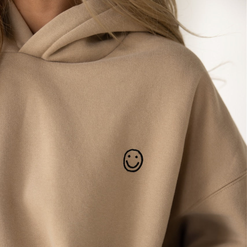 My mother told me to pick the very best + this soft, french terry hoodie is it. The embroidered smiley face detail makes this an effortless look with a subtle touch of sunshine. The weather outside might be changing, but we got nothing but smiles here :) Tan
