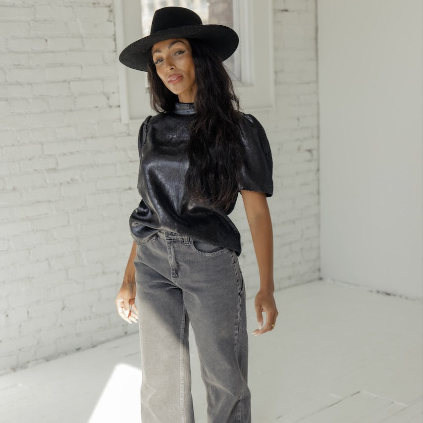 Such a sophisticated blouse. This relaxed silhouette lends a laidback feel with an eye-catching ornate design that gives this piece romance and flounce. Wear it out or tucked in and let it be the star of your look, pairing it with your favorite accessories.