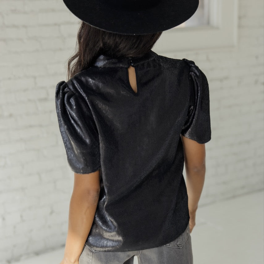 Such a sophisticated blouse. This relaxed silhouette lends a laidback feel with an eye-catching ornate design that gives this piece romance and flounce. Wear it out or tucked in and let it be the star of your look, pairing it with your favorite accessories.