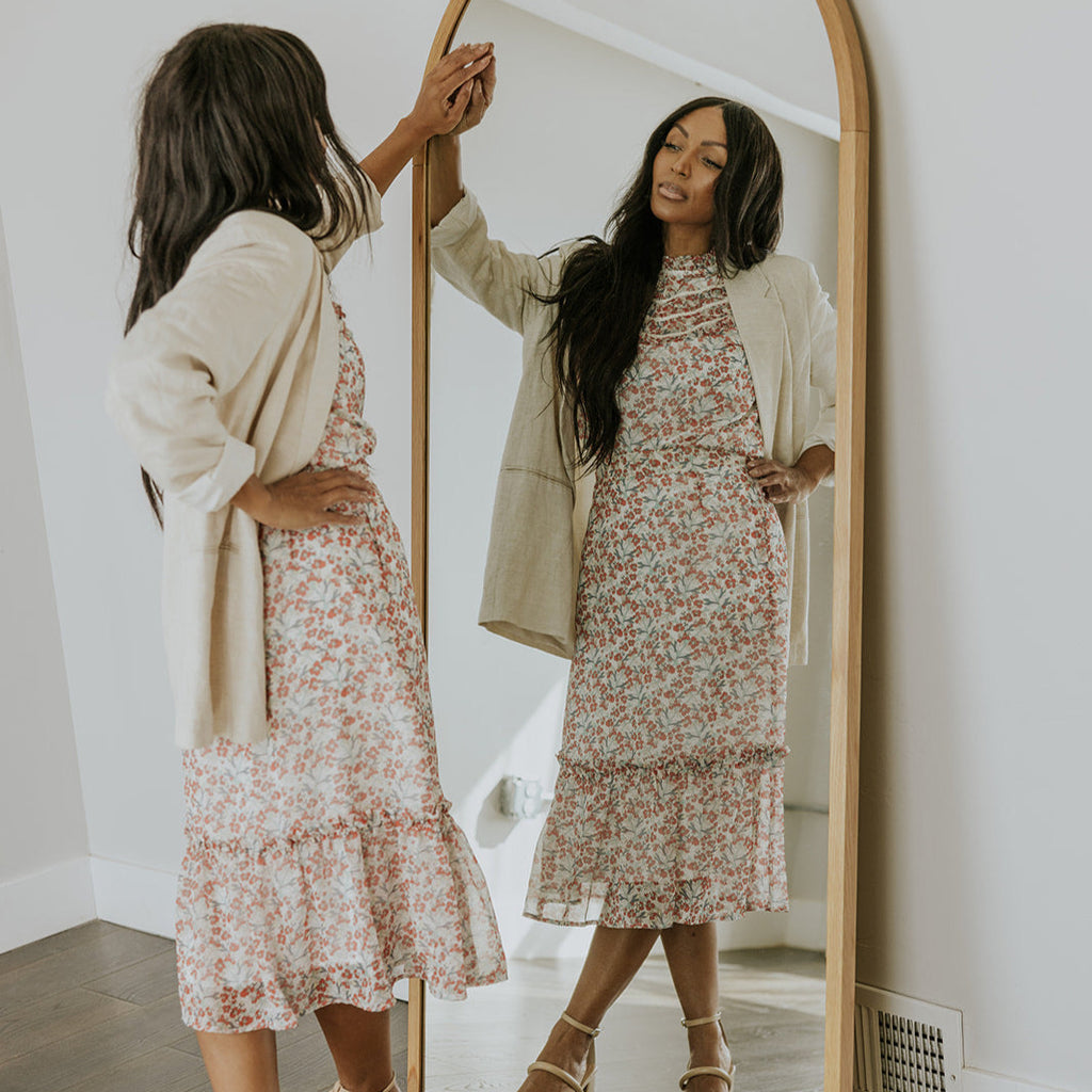 The Cressida Skirt was designed with an a-line silhouette accented with a dainty floral pattern that was made for women of any age.