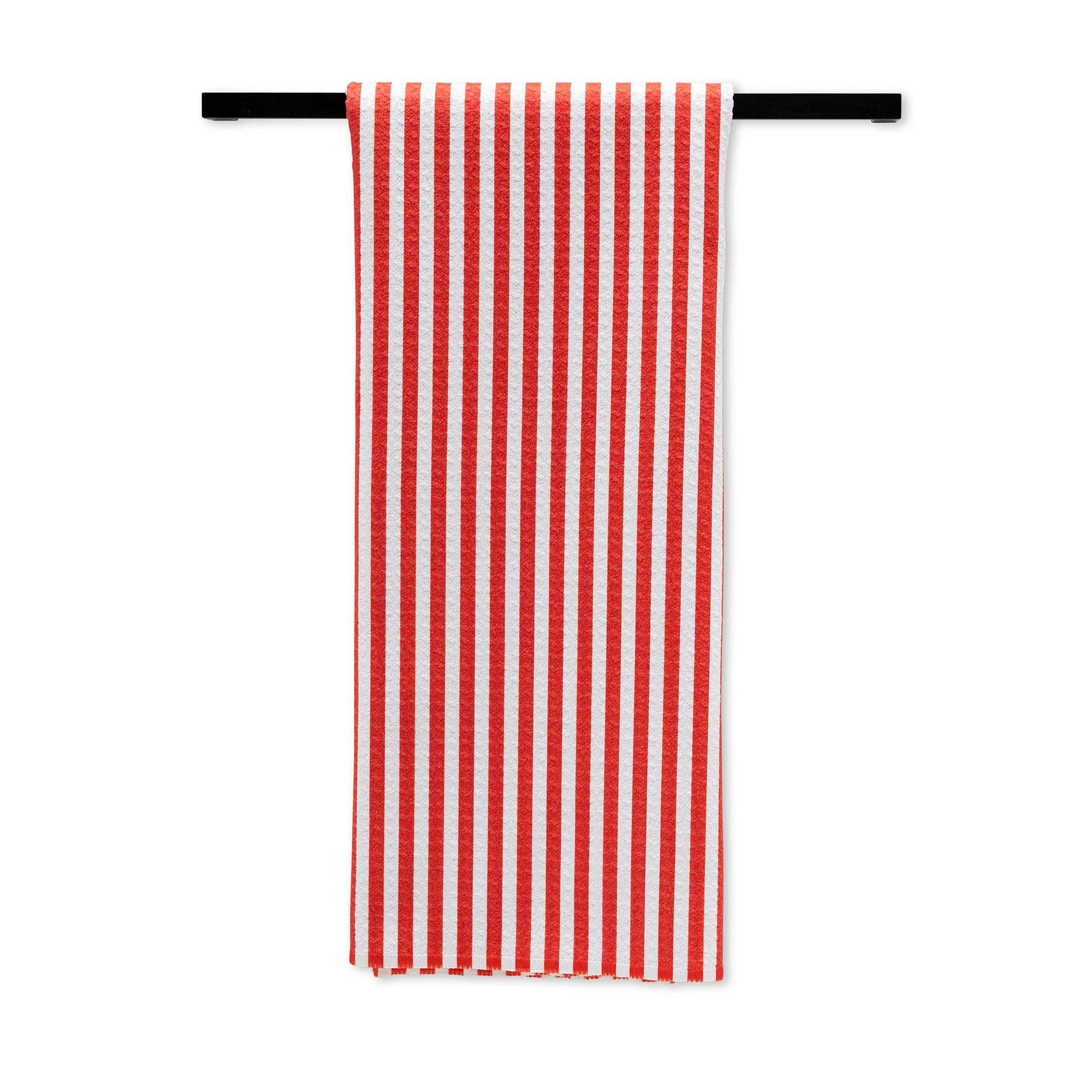 Red and white striped towel hanging on a black rod against a white background
