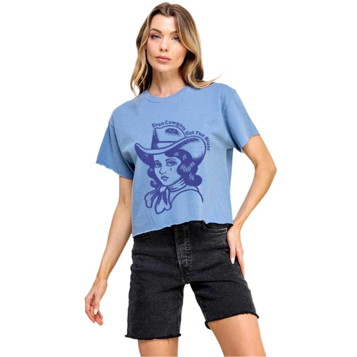 Woman wearing a blue t-shirt with a graphic design on a white background