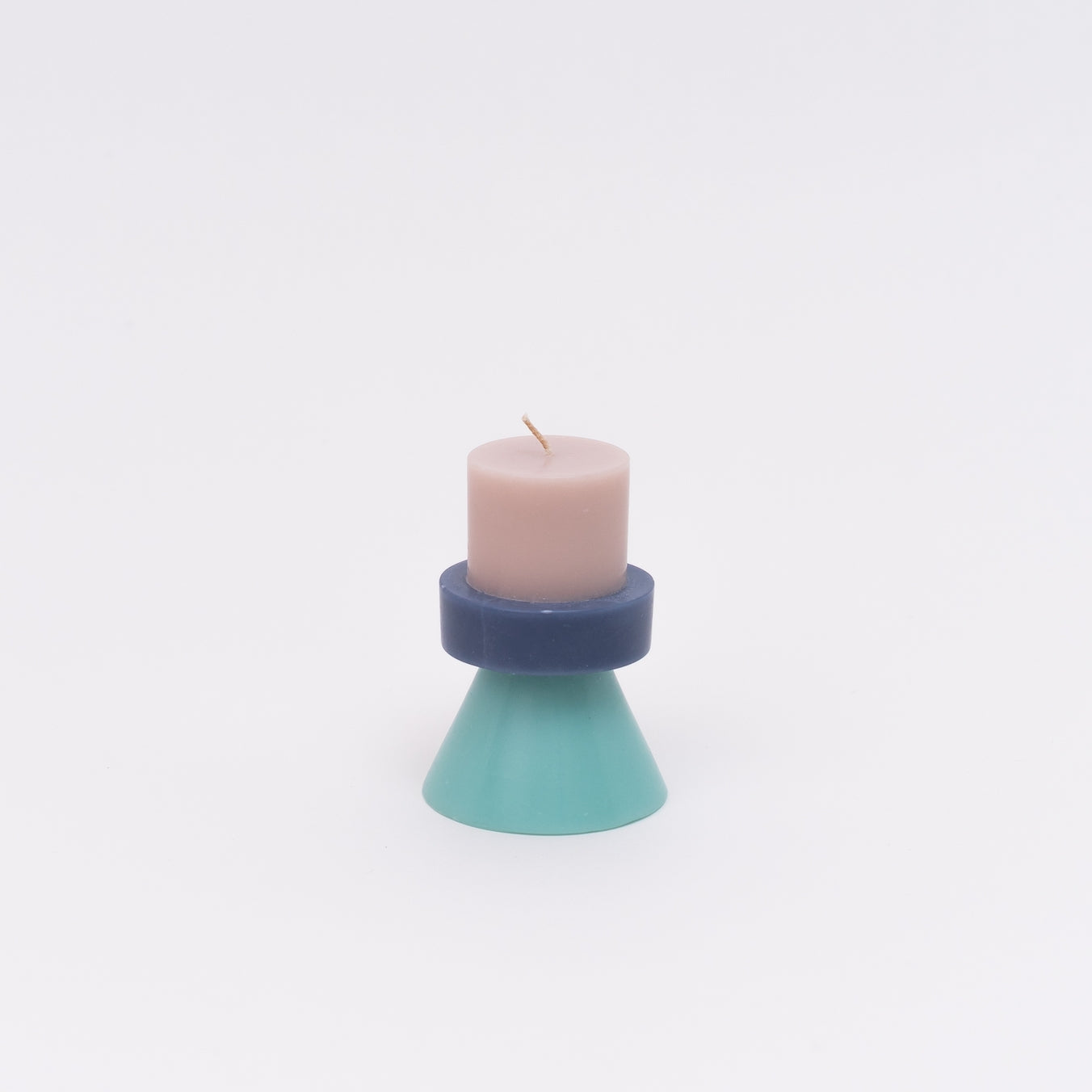 The colors of these stack candles have been carefully chosen to create a playful combination. All of the candles are individually hand poured by skilled fair trade artisans layer by layer to form the multi colored effect.     Color  Nude / Powder blue / Celeste