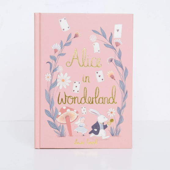 Pink book cover with 'Alice in Wonderland' design on a white background