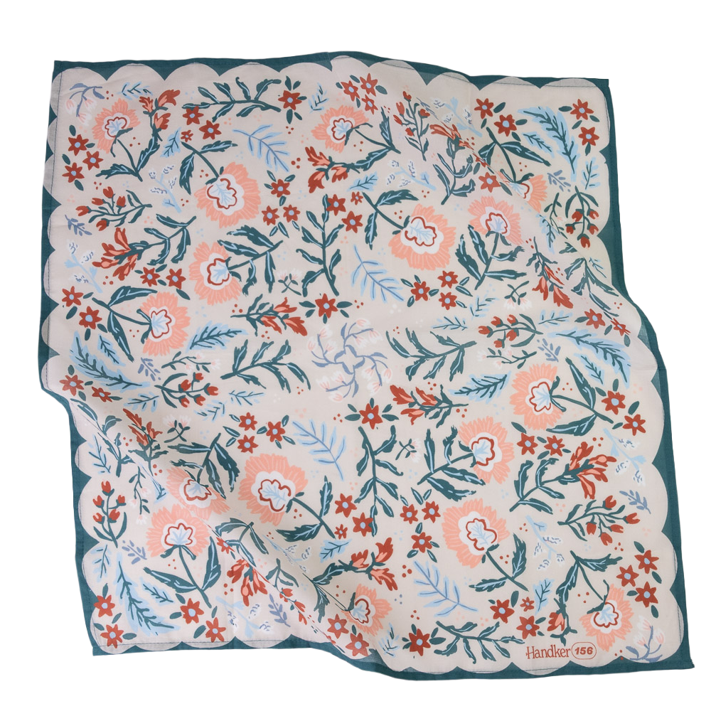 Floral patterned fabric with pink and blue flowers on a white background