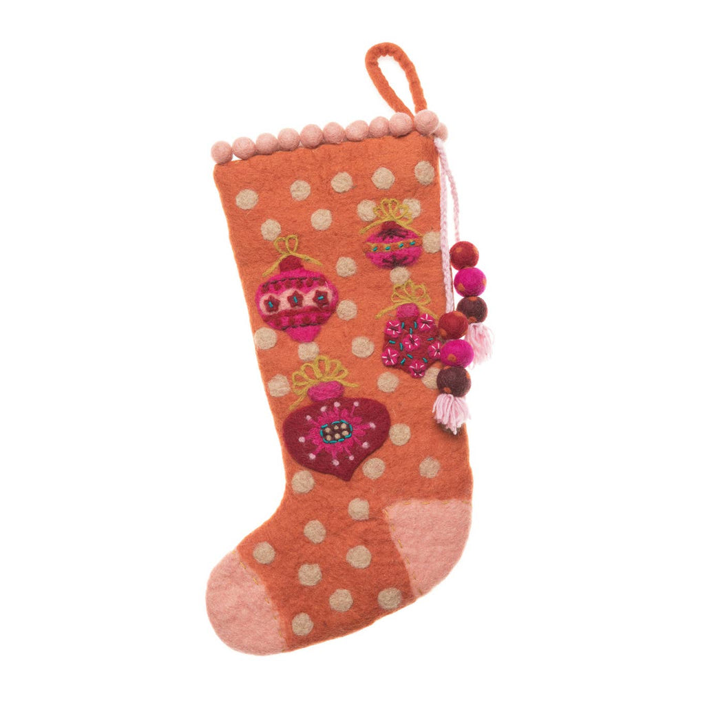 Hand felted Orange stocking with ornamental detailing and hand embroidery throughout.  Handmade in Nepal from 100% wool felt.     Size  Stockings measure 19" in length.