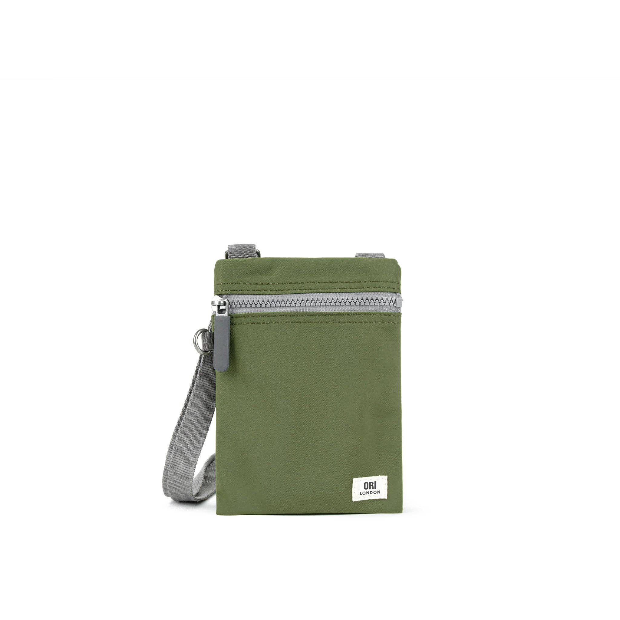 Our hands-free extra pocket is always by your side. The Chelsea is our great little crossbody pocket to keep those special things close and safe. Avocado

Give your phone, card and essentials their very own stylish way to be carried whilst you are on the move. Our brand-new Chelsea collection is the perfect lightweight, urban accessory for you to travel light and always be on the move.

Made from recycled material, the Chelsea has been designed to keep your mobile phone, cards, and valuables close by.