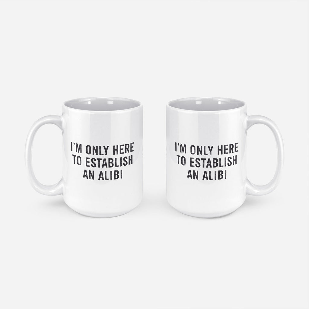 white mugs reading "I'm only here to establish an alibi" in a black font
