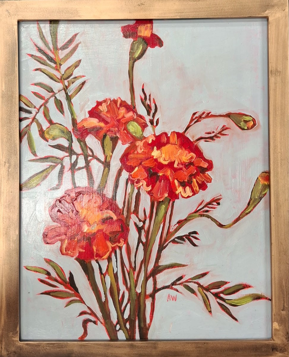 A group of four bright red and orange dahlias with green stems. A few buds surround them along with green leaves. The background is blue and purple.