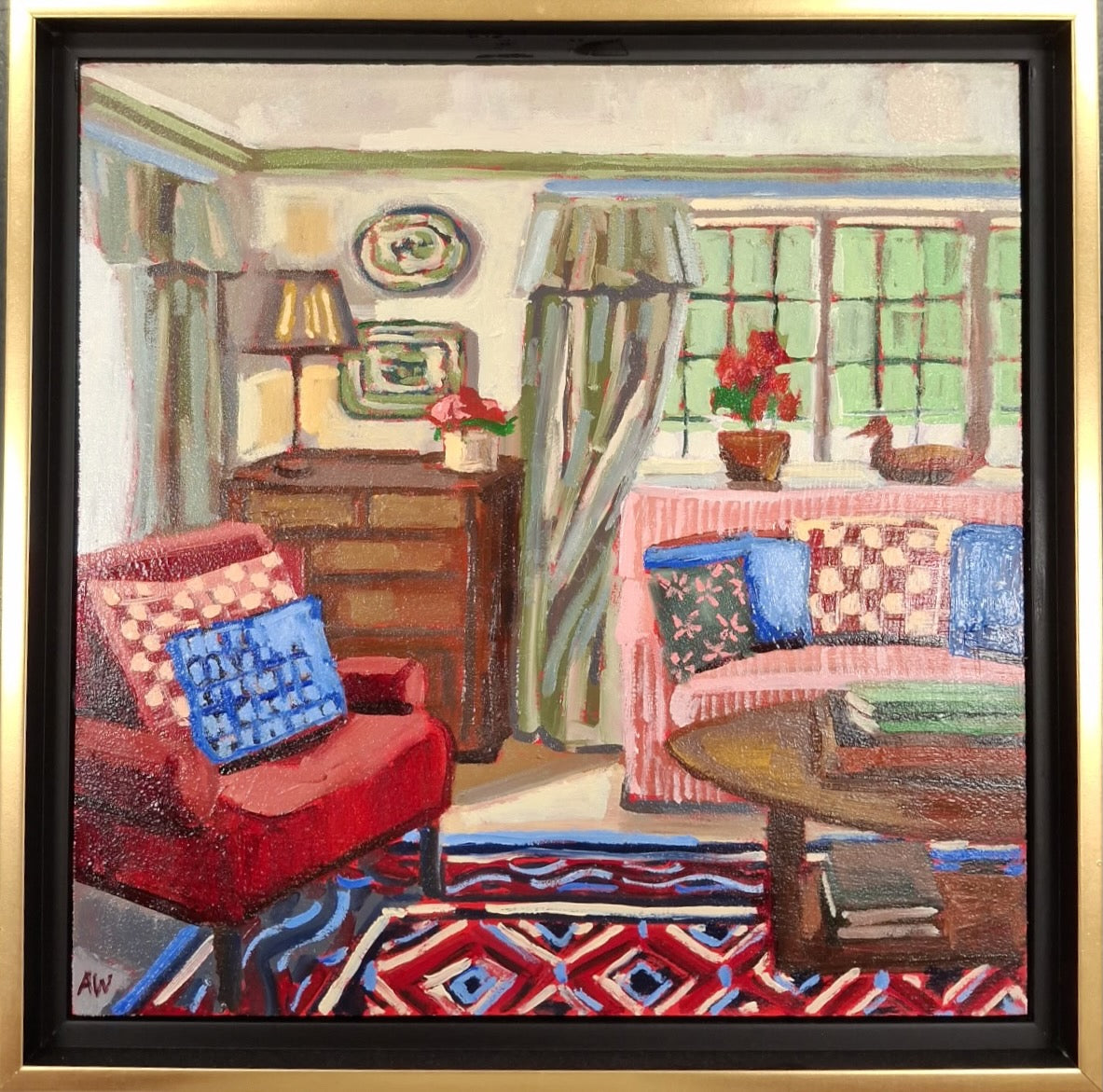 A scene of the corner of a living room with a red armchair and a red and white striped couch. The red chair has a red and white checkered pillow as well as a blue pillow and the couch has blue, green, and red patterned pillows. Behind the red char is a brown dresser in the corner against the walls with a gold lamp and vase resting on the top of the dresser. The wall has big windows and green, flowy curtains. Behind the couch is a flower pot and a wooden duck. In the foreground is a brown coffee table & rug.