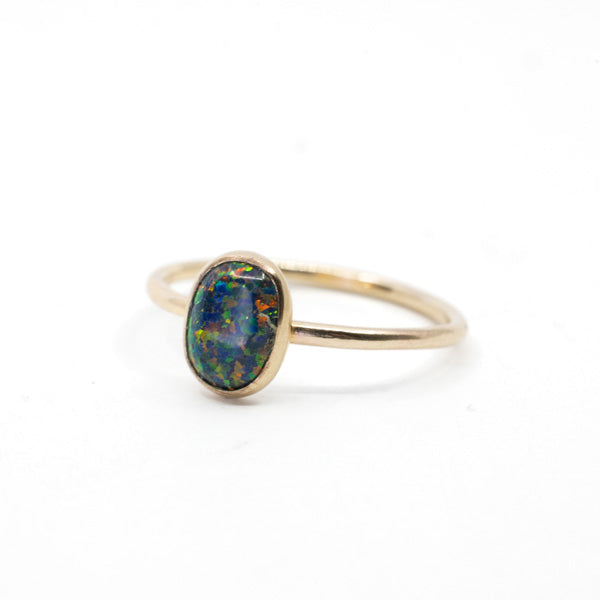 Black Opal Oval Ring in Gold