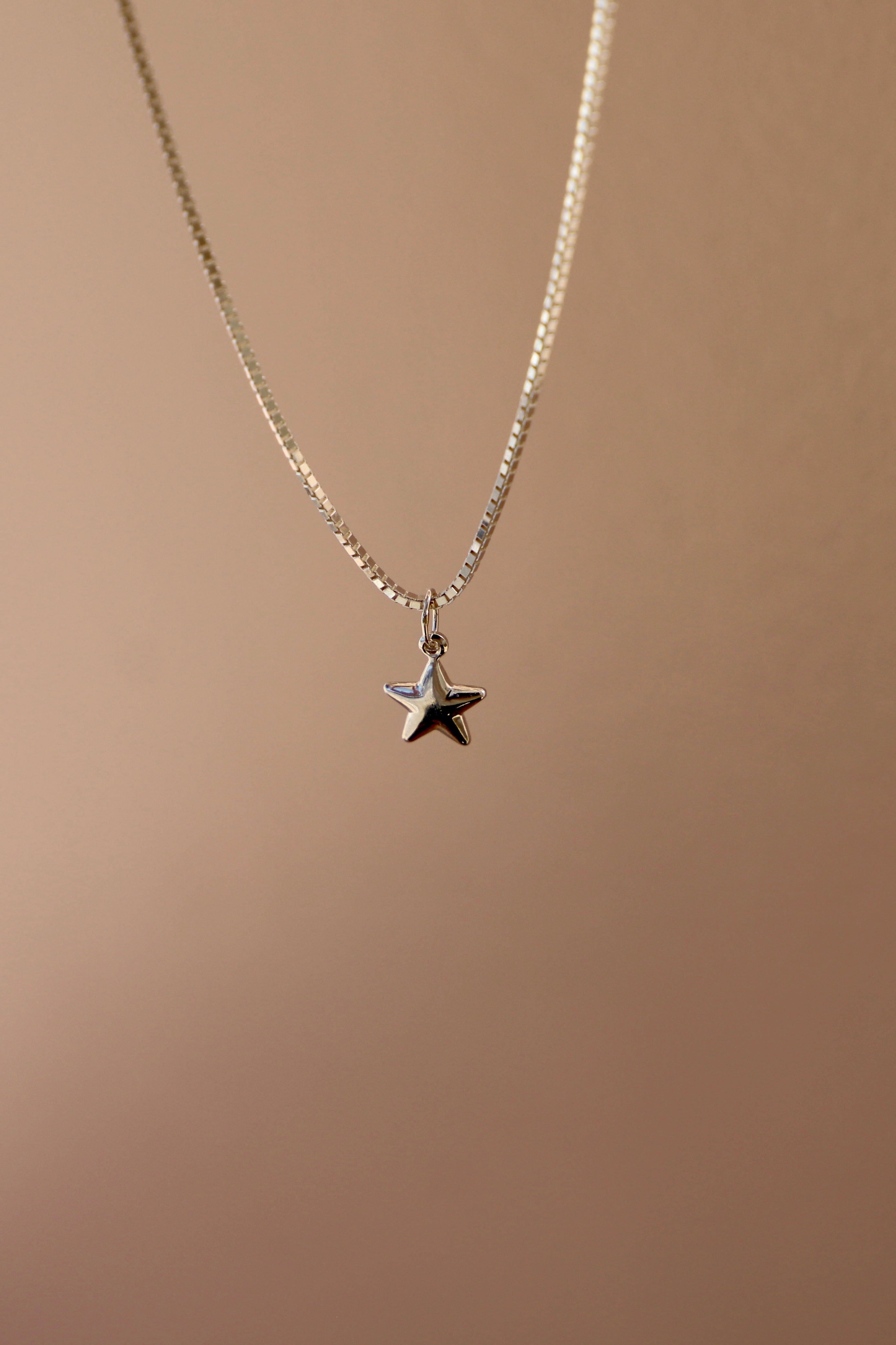 SILVER STAR CHARM