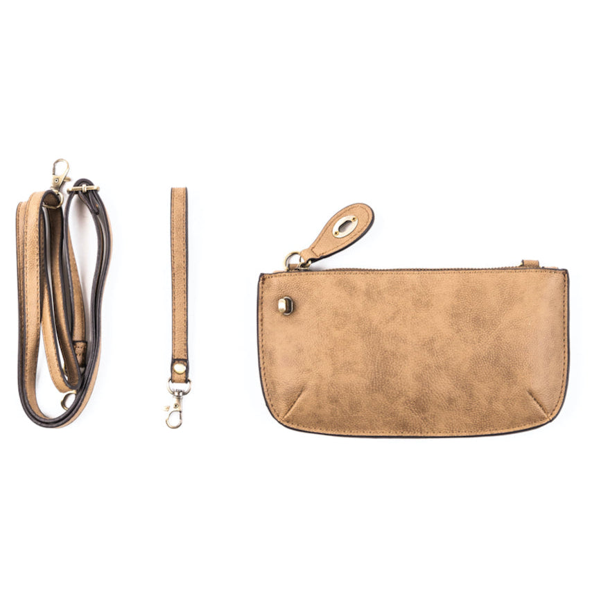 The Uptown Messenger Purse is perfection in a handbag! This versatile piece can be used as an adjustable cross-body bag, wristlet, or a simple wallet, making it the perfect finishing touch to any night out. A zippered top and rotating clasp closure are timeless elements that will make this the most functional purse you'll ever own!
