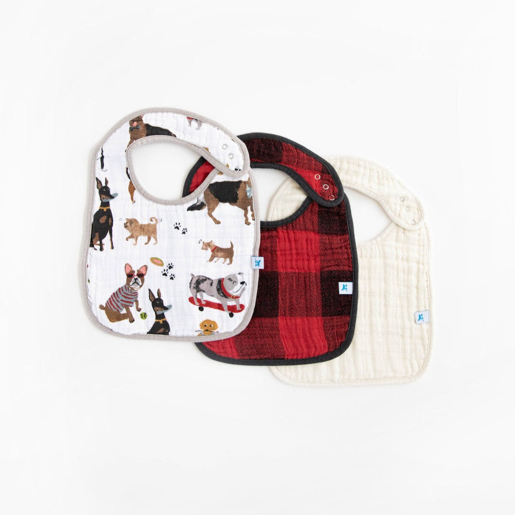 Soft and absorbent, our multi-layer bibs are built to handle all of baby's spills and messes. Featuring three unique, hand-painted prints and a snap-on function to ensure a snug fit that grows with your baby. Cotton Muslin Classic Bib 3 Pack - Woof.      Materials  100% cotton muslin.