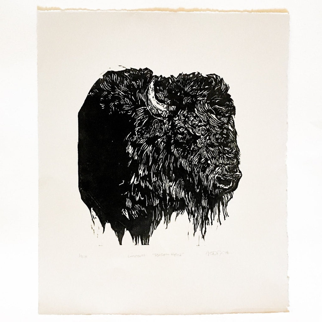 hand carved and pressed black and white 11x14 print of a bison head