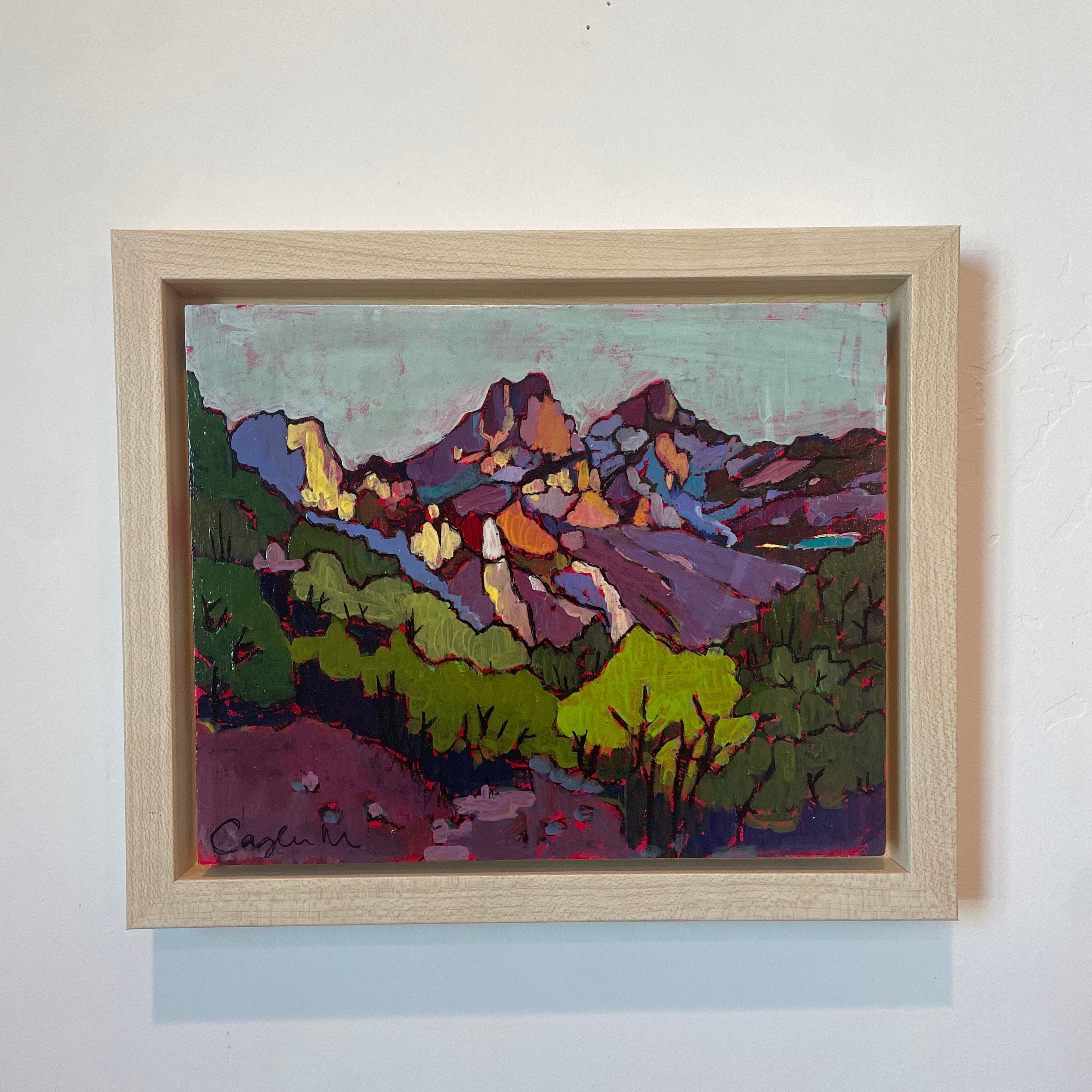 Bright hues of yellow, orange, blue, and purple are used to show the dusky image of the mountains on Slate Canyon Trail. There are trees filling the foreground as if you are standing on the trail itself and looking beyond. The trees are full and seem to be in their fullest form. The mountains are big and tall and the sky is blue and purple. 