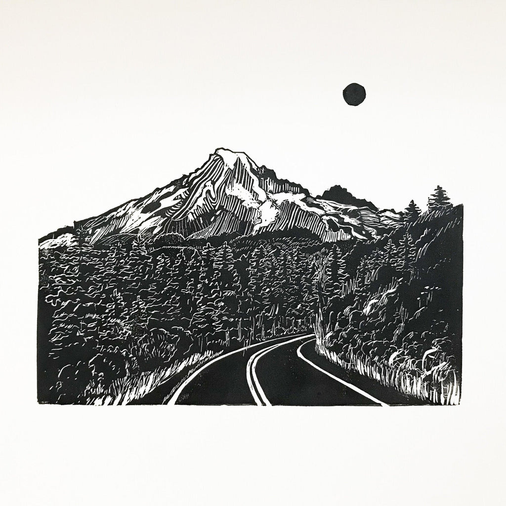 hand carved and pressed black and white 5x7 print of a road through the mountains and trees