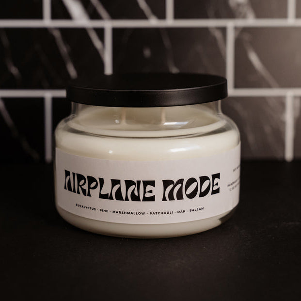 Airplane Mode Double wick 12 oz soy wax candle in an apothecary glass vessel