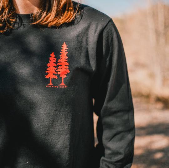 Snowy Sky Lift Daily Long Sleeve featuring a snowy winter landscape with gondalas