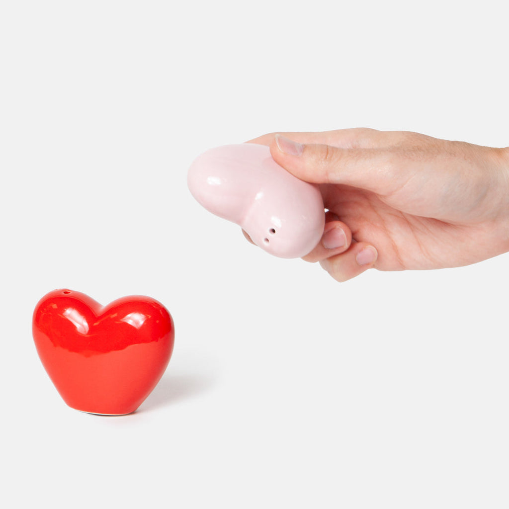 Ceramic salt and pepper shakers shaped as hearts to share and display your love at home.