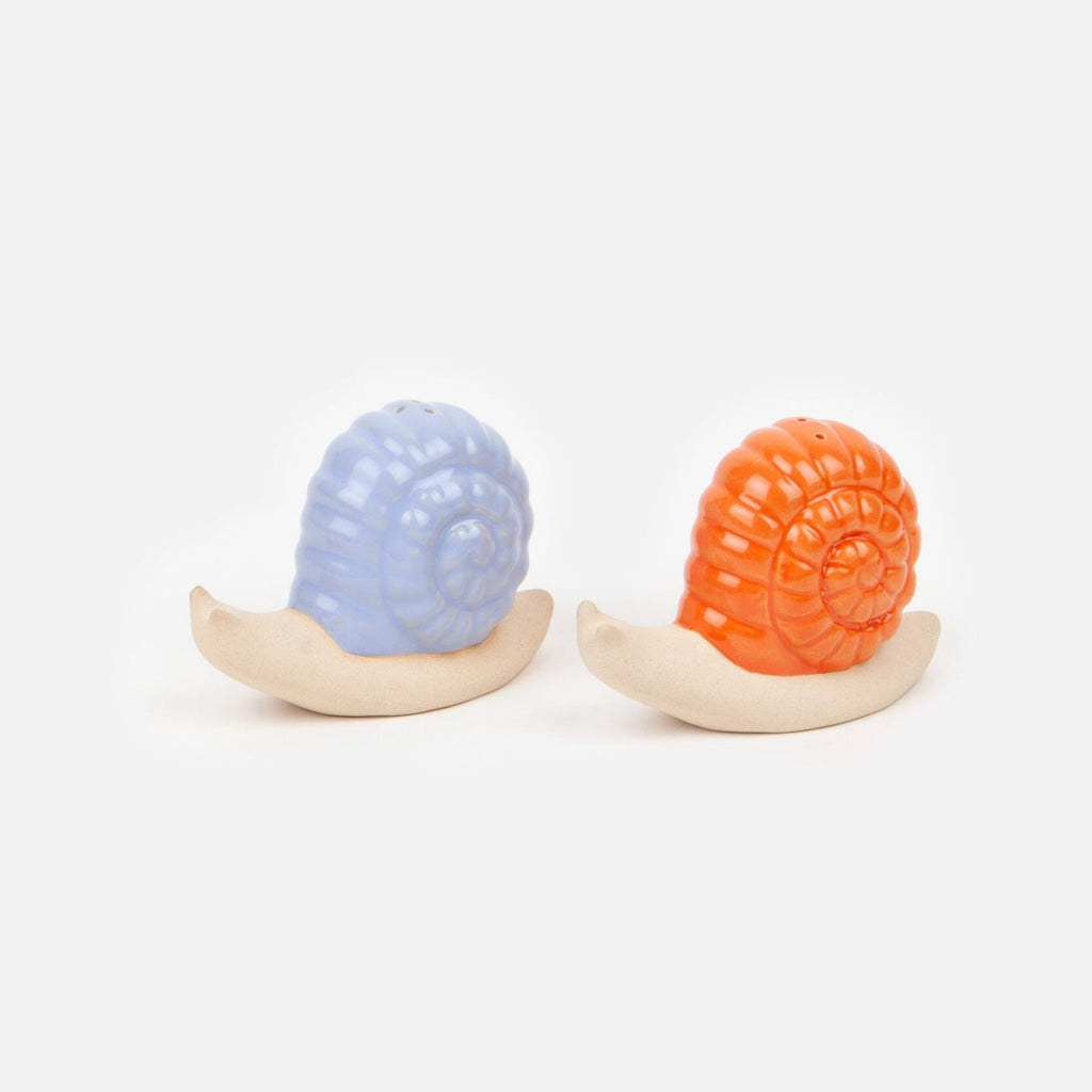 Add a pop of color to your dining experience with these playful Lilac &amp; Orange Salt &amp; Pepper Shakers. These quirky shakers will spice up your meals and add a touch of fun to your table. Indulge in flavorful meals with this unique set.