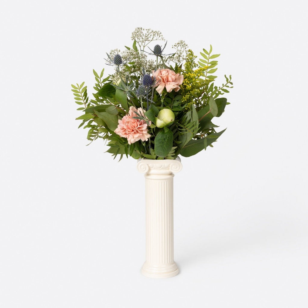 Add a touch of ancient charm to your home with the Athena Ionic Column - Ceramic Vase. Its elegant design and sturdy ceramic material make it perfect for displaying your favorite flowers. Elevate your interior décor with this stunning piece.