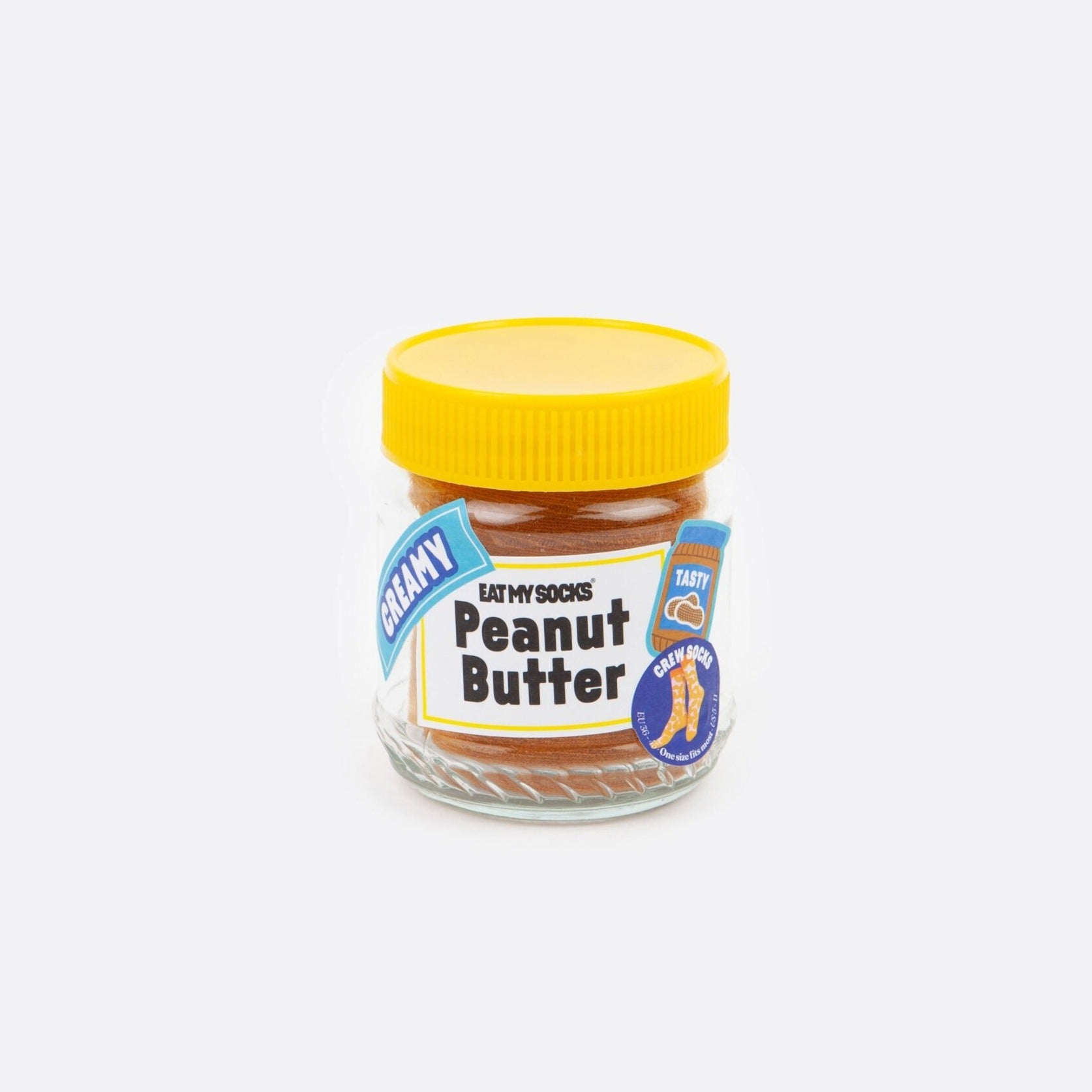 A cozy pair of socks snugly packed within a familiar peanut butter jar makes for an unexpected and delightful gift.