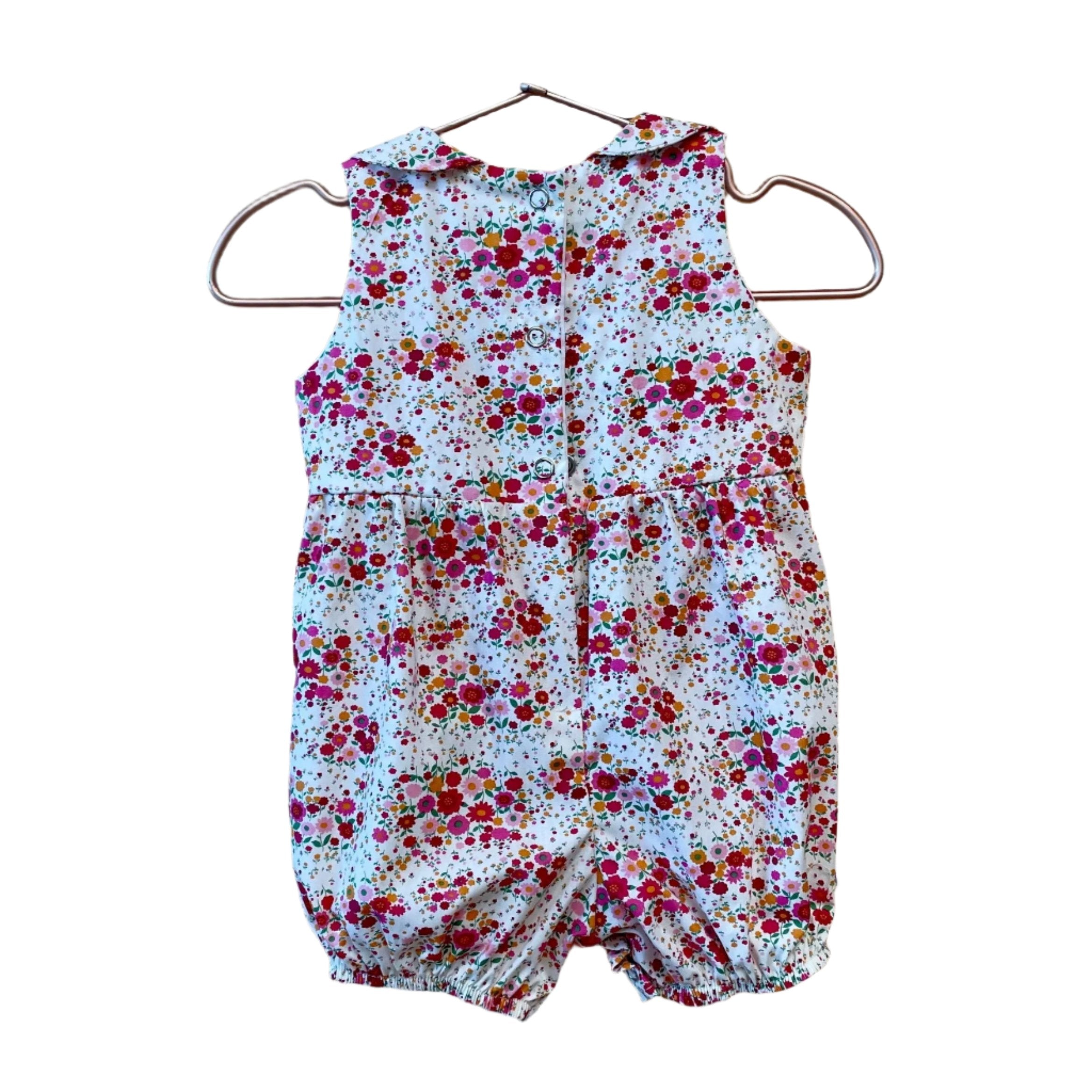 Dress up your little one in the Harper Romper and have everyone petal-ing all over your stylish babe! This beauty features Petite Garden. Pink and is sure to make your kiddo look hip and cool! Put your mini in the Harper and everyone will be buzzing like a bee! 