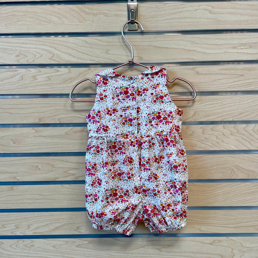 Dress up your little one in the Harper Romper and have everyone petal-ing all over your stylish babe! This beauty features Petite Garden. Pink and is sure to make your kiddo look hip and cool! Put your mini in the Harper and everyone will be buzzing like a bee! 