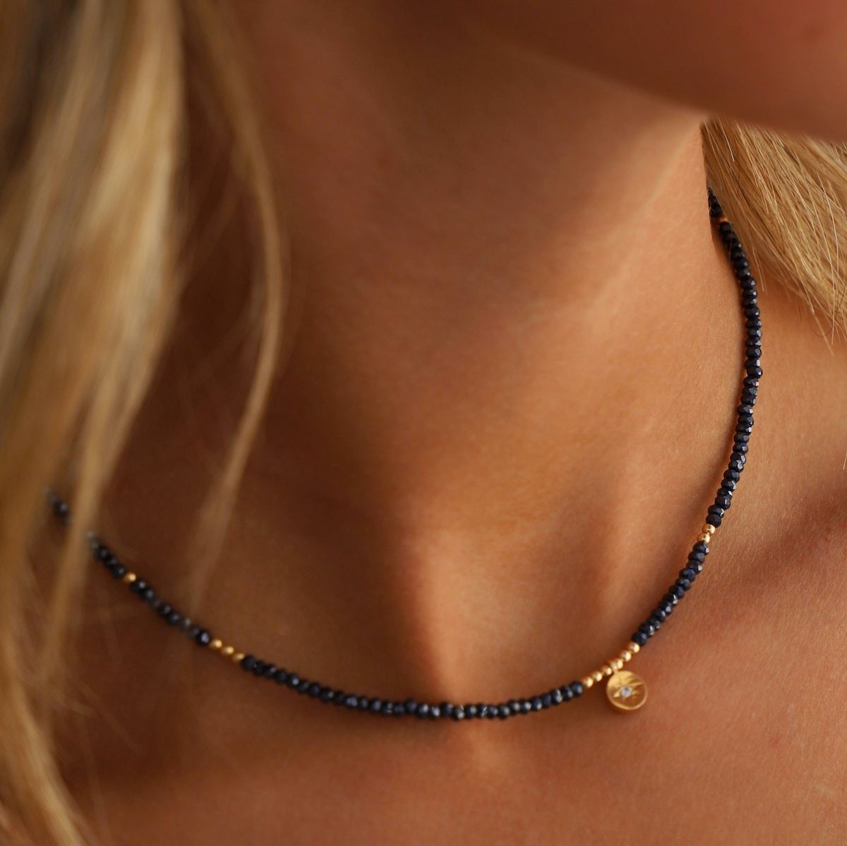 This necklace is a star-studded delight! Featuring a beautiful beaded star medallion, this piece will add a touch of whimsy to any outfit. Perfect for adding a playful touch to your style, this necklace is a must-have for any jewelry collection. Shine like a star with this unique accessory!