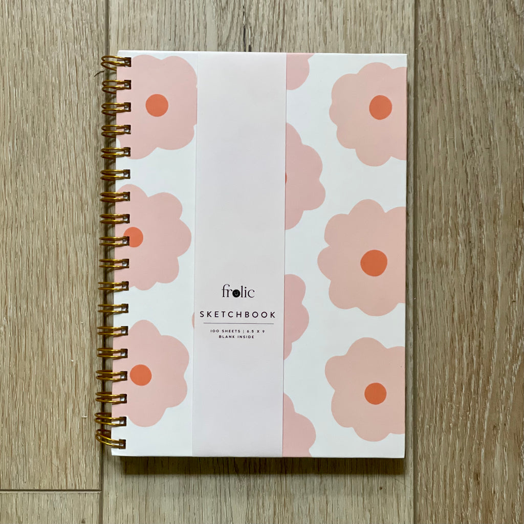 Pink Floral Sketchbook - Frolic  100 Sheets / 6.5 x 9 / Blank Inside  Description:  Cover: Pink Floral on Cream Background, Spiral Bound