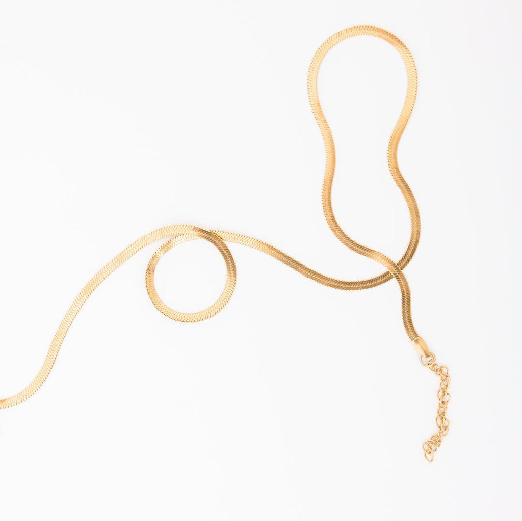 14k gold filled chain over stainless steel. Hypoallergenic, will not tarnish, will not irritate skin. Available in 3 mm (Skinny Brene) or 4 mm (Brene). Available in 15.5-17.5" length (Has a two inch extender on the back) or 17.5-19.5"
