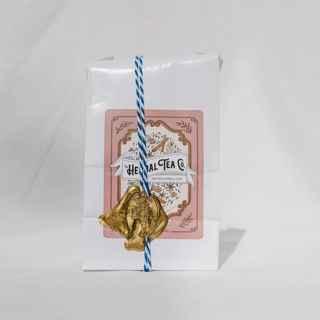 Spiced Herbal Chai white refill bad with The Herbal Tea Co. logo