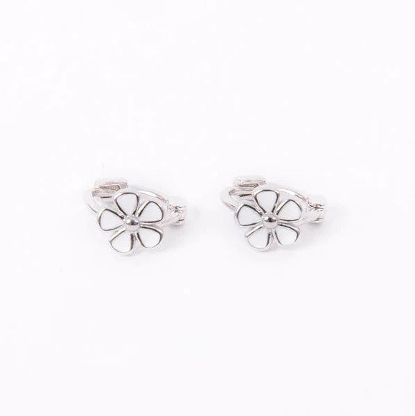 Inset daisy with unique texturing and five tiny enamel petals. Silver huggie hoops
