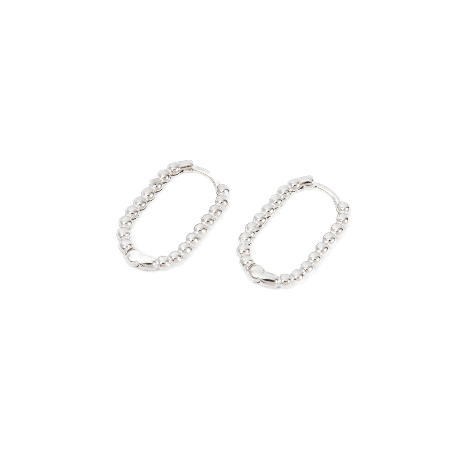 Silver oval huggies with bubbled details going all the way around