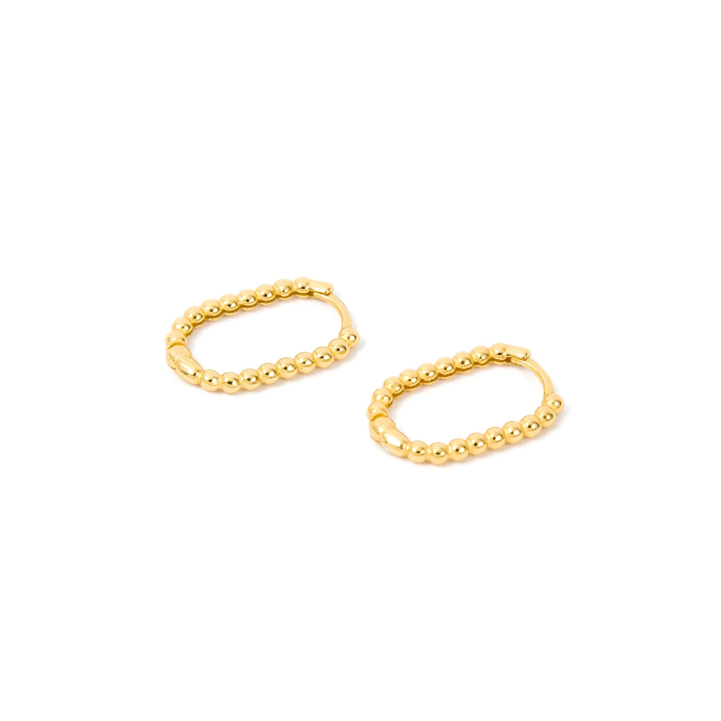 gold oval huggies with bubbled details going all the way around