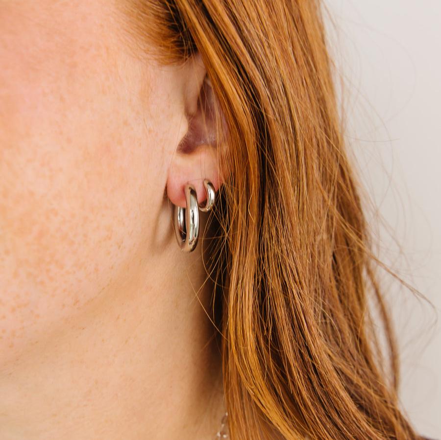 90's Huggies   You know what was the comeback we never knew we needed?&nbsp; The 90s!&nbsp; With bold, chunky styles, baggy jeans, and hoops all up and down the ear, 90s were a decade never afraid of being too much!&nbsp; And now we've got the perfect hoop to match the vibe!