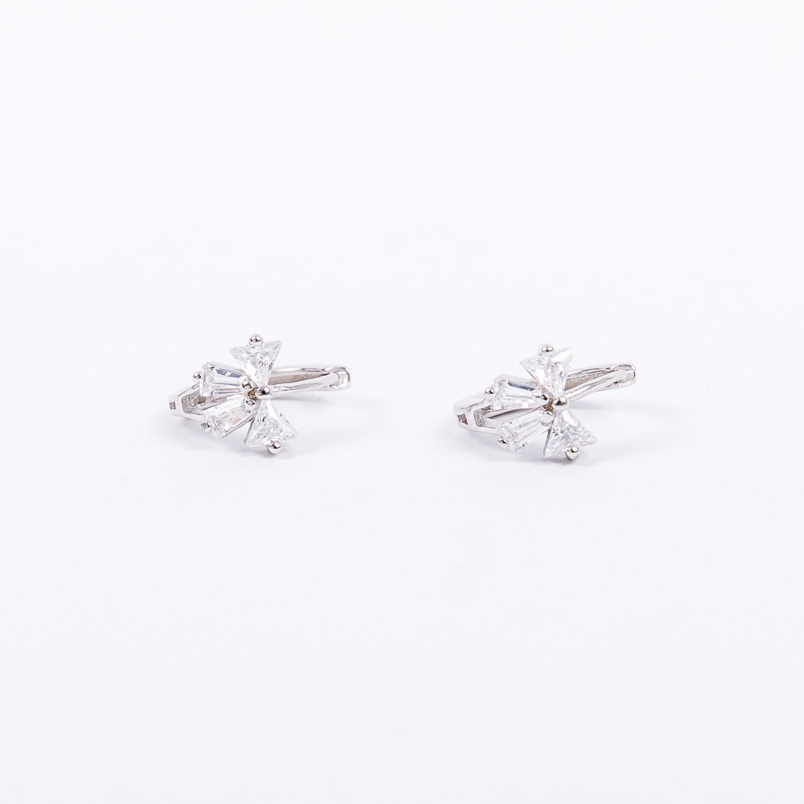 sterling silver huggies with CZ bows