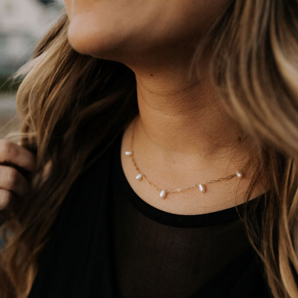 The Adelaide Pearl Necklace combines the best of two jewelry staples: a classic pearl necklace with our best selling paperclip chain. With these two styles of necklaces combined, we know you'll love this necklace that has the best of everything!