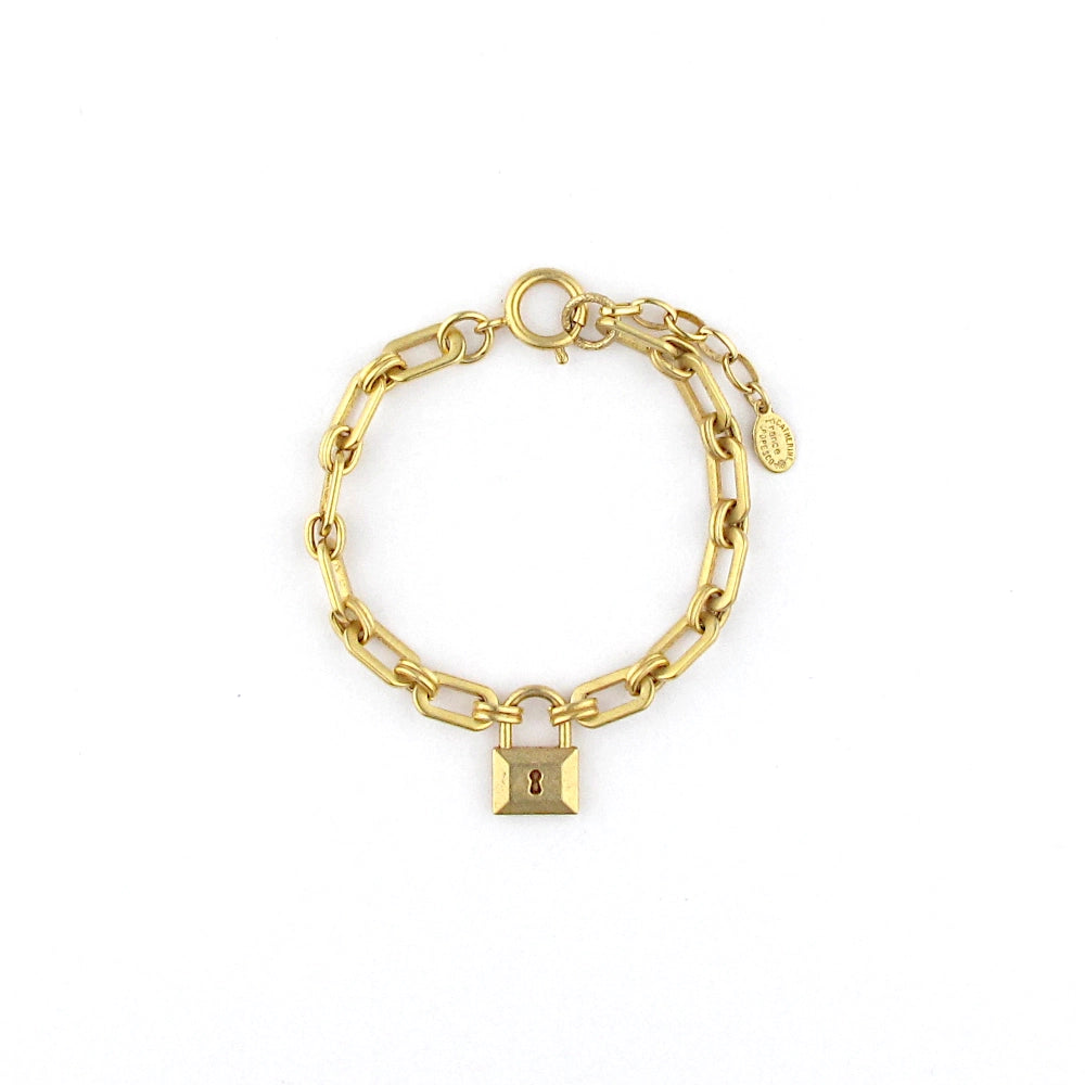 A lock of love to protect the one you love. A graceful lock charm with paperclip chain.
