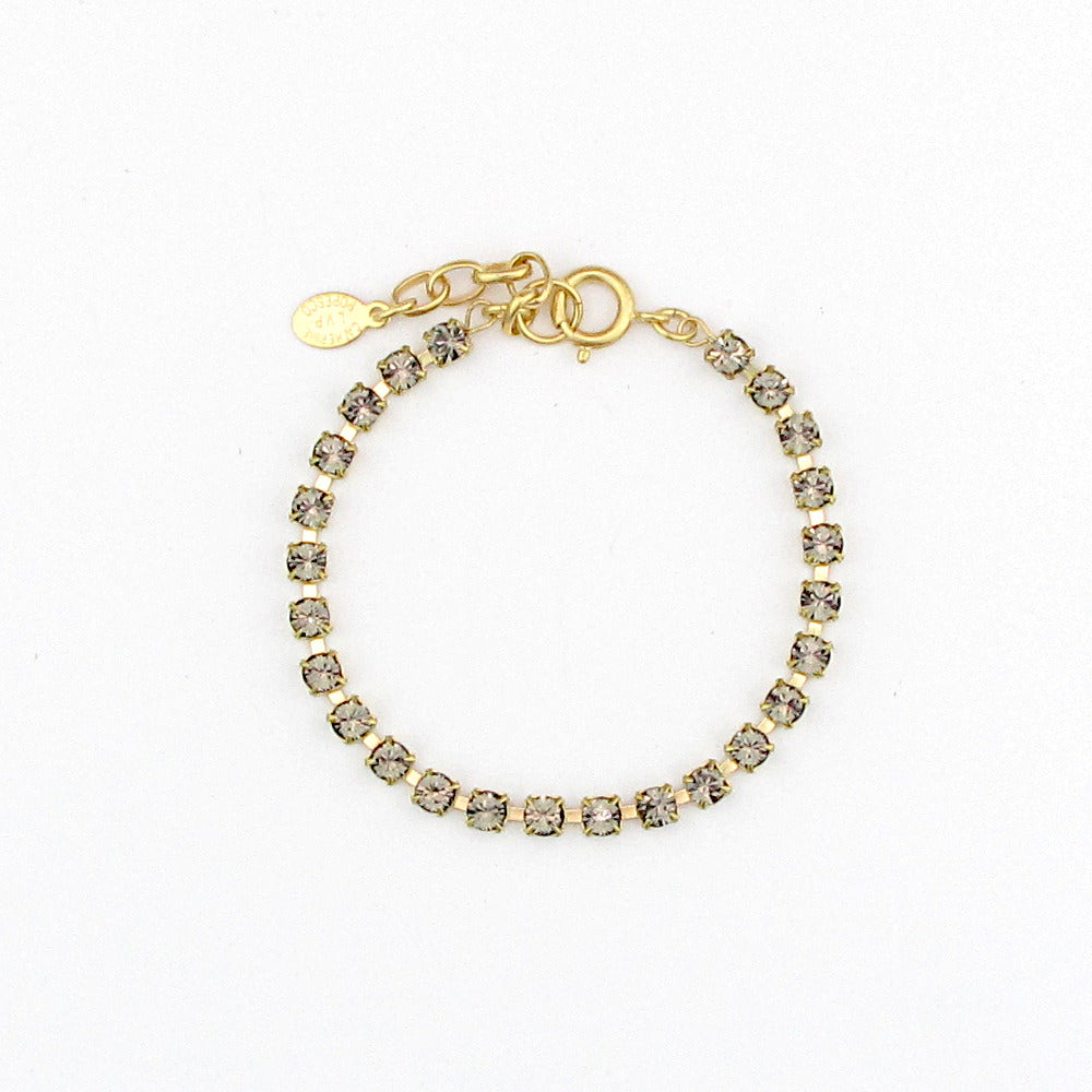 The delicate Dior bracelet, a smaller version of our classic Quincy bracelet. 24pp Swarovski crystal link, works for every layering combination.