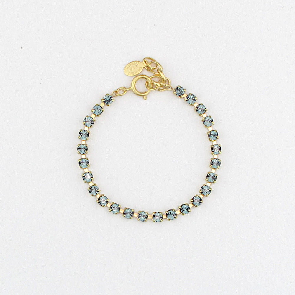 The delicate Dior bracelet, a smaller version of our classic Quincy bracelet. 24pp Swarovski crystal link, works for every layering combination.