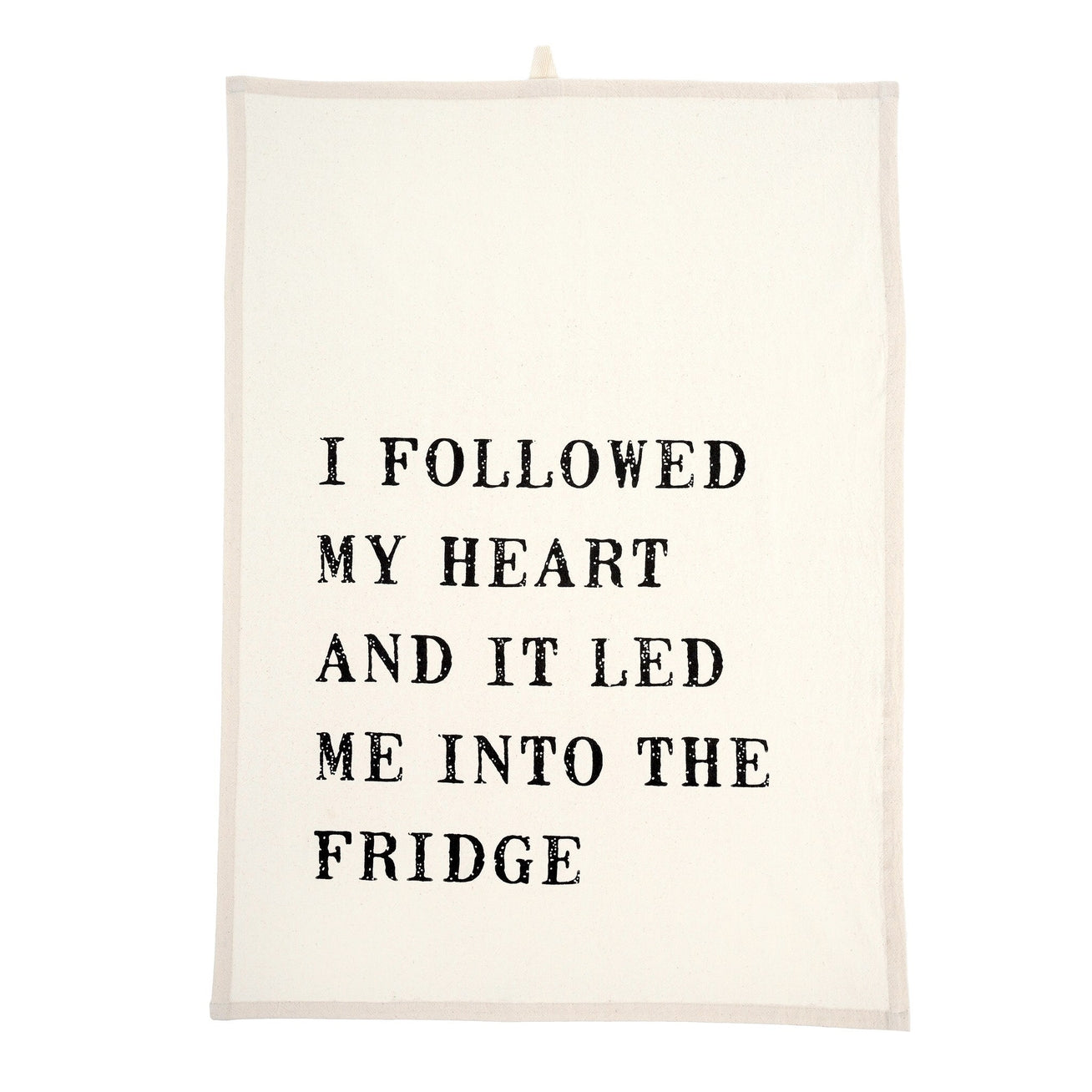 A white cotton tea towel with the text 'I followed my heart and it led me into the fridge' printed in black.