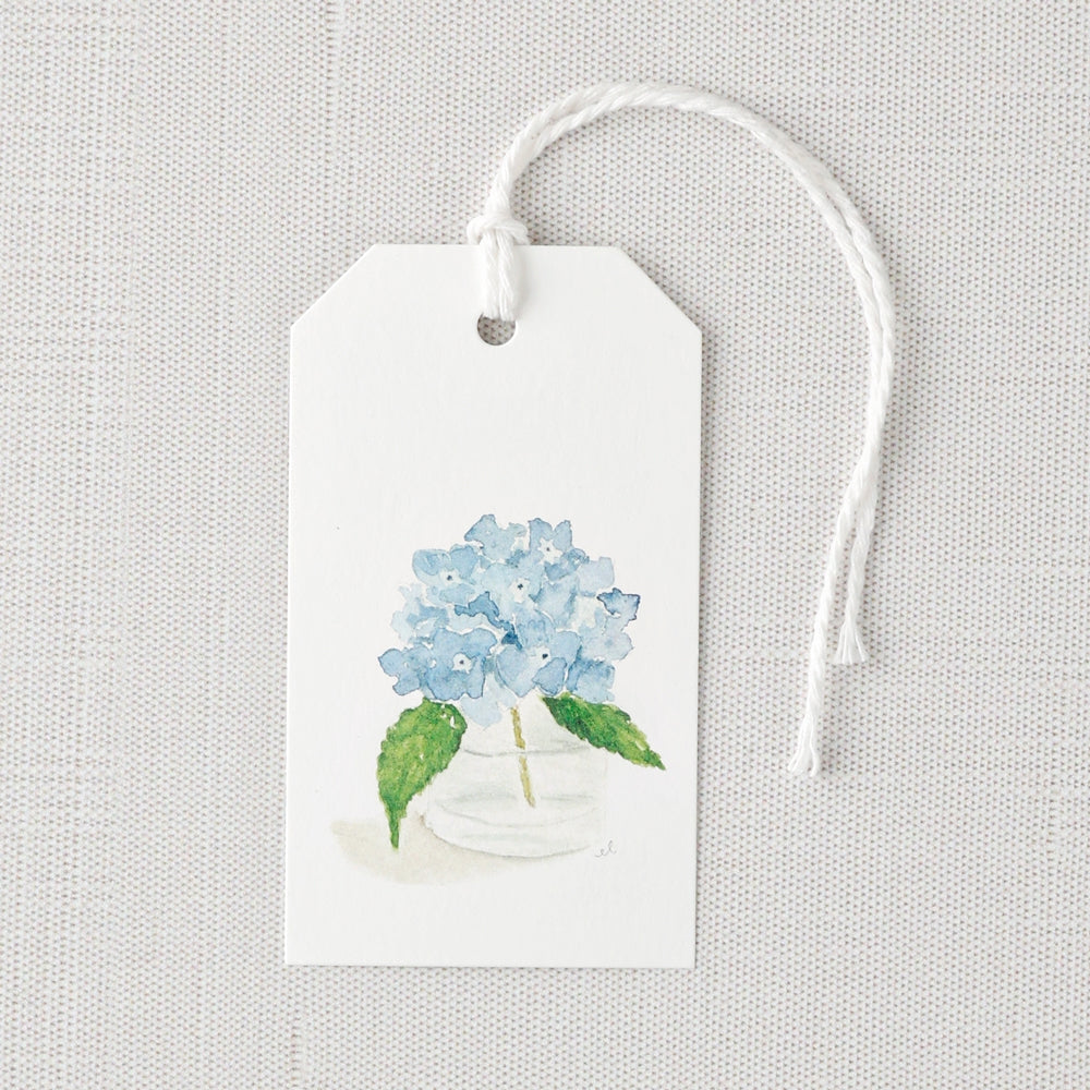 Add a finishing touch to your wrapped gifts with a cheerful gift tag. Blank on reverse for space for a note or name.