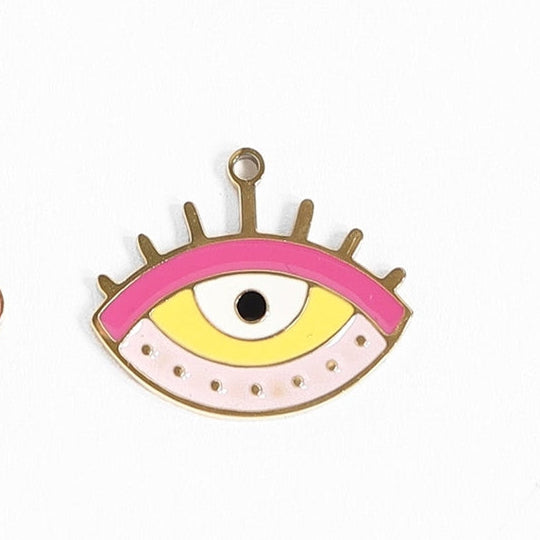 Give your jewelry collection an eye-catching update with our 18K Gold PVD Eye Charm. The playful pink details add a pop of color to this unique charm featuring an eye design. Perfect for adding some whimsy to any accessory, this charm is sure to turn heads!