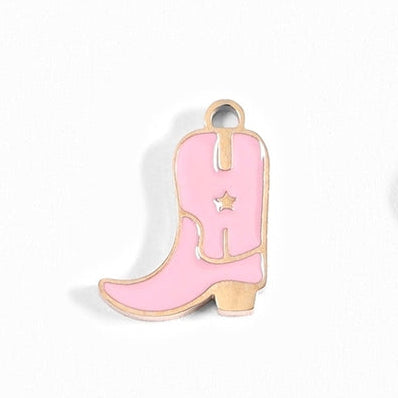 Yeehaw! Add some flair to your outfit with this playful 18K Gold PVD Pink Cowgirl Boot jewelry charm. Perfect for any cowgirl at heart, this pink boot adds a touch of personality to your collection. So kick up your heels and show off your unique style!