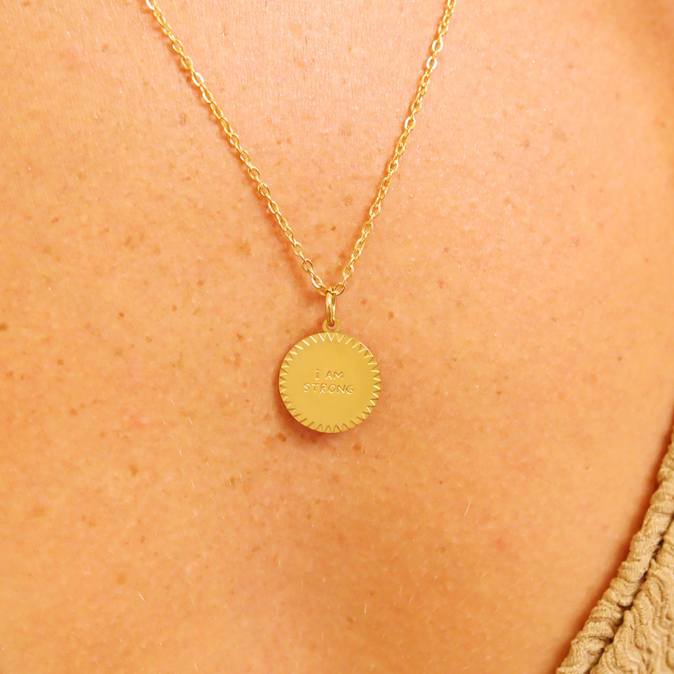 Make a statement with our NEW inspirational "I Am Strong" charm! The perfect sentimental accent to add to your necklaces and bracelets, this charm is a great reminder that you can wear daily to make your jewelry more than just a fashion accessory!